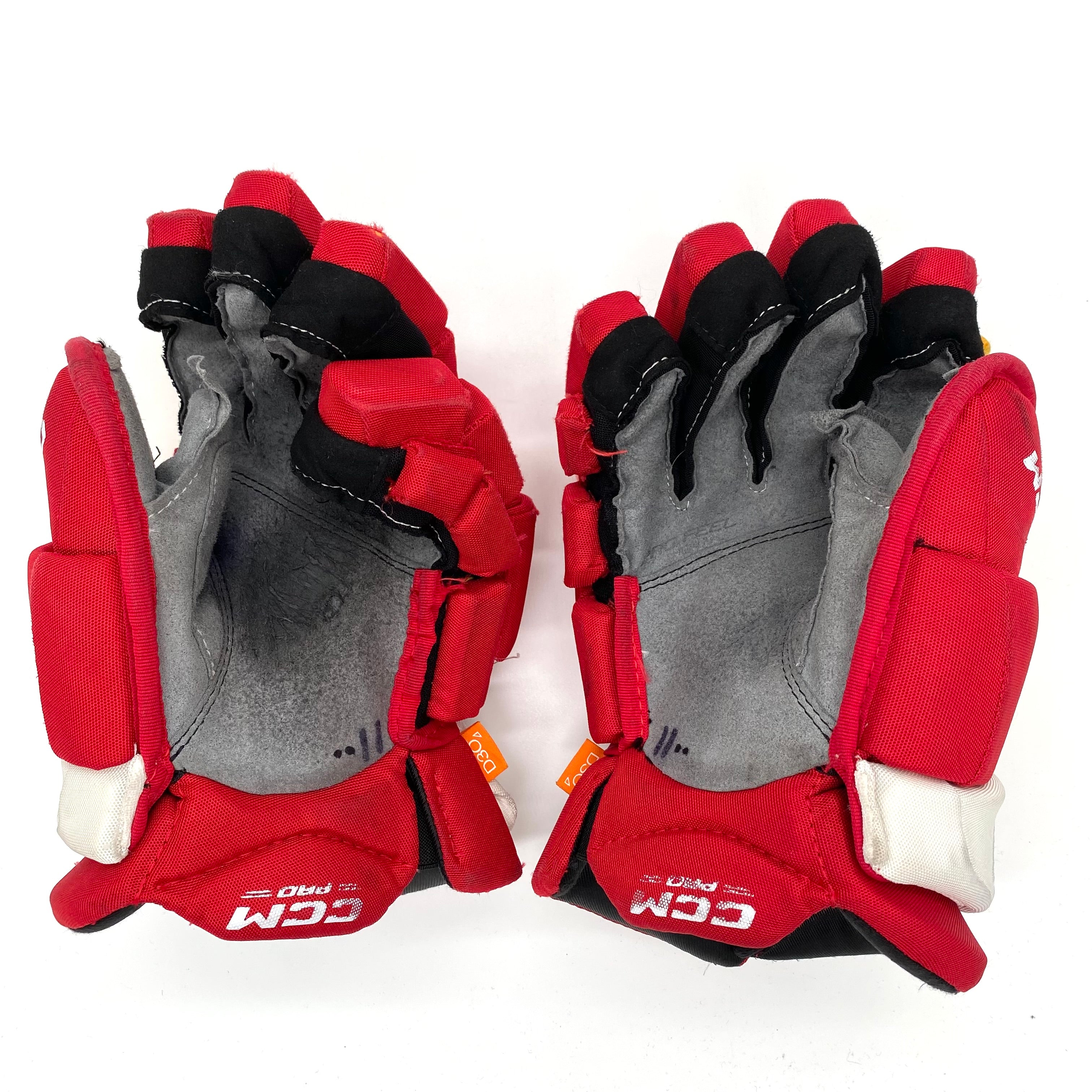 CCM HGJS - Gants Pro Stock d'occasion (rouge/jaune)